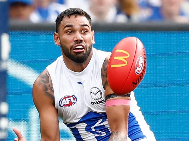 MELBOURNE, AUSTRALIA - AUGUST 19: Tarryn Thomas of the Kangaroos marks the ball during the 2023 AFL Round 23 match between the Richmond Tigers and the North Melbourne Kangaroos at Melbourne Cricket Ground on August 19, 2023 in Melbourne, Australia. (Photo by Michael Willson/AFL Photos via Getty Images)