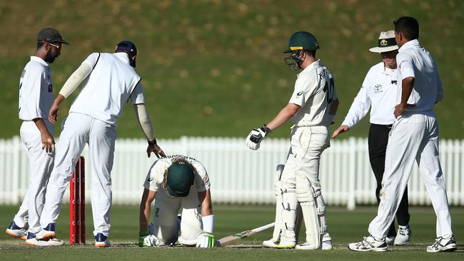 Will Pucovski after been struck in the helmet during the tour match at Drummoyne Oval. Picture: Getty Images