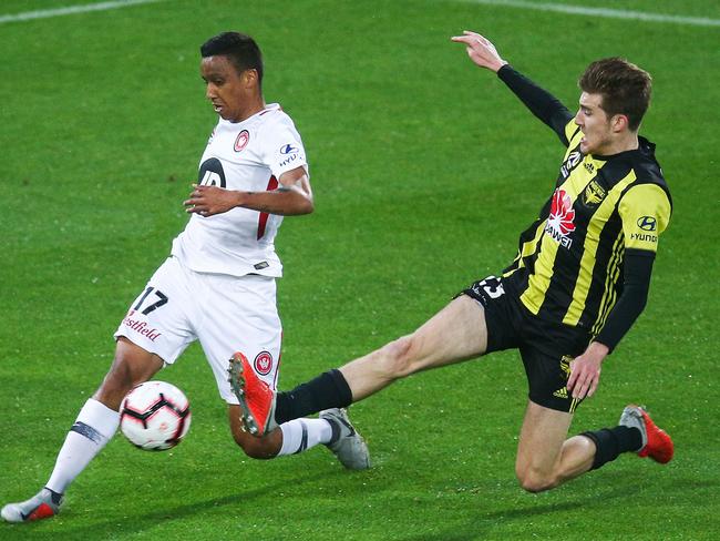 Keanu Baccus of the Wanderers is tackled by Max Burgess of the Phoenix. Picture: Getty Images