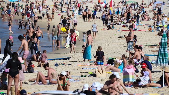 Sydneysiders enjoying the hot weather in Bondi Beach as Covid-19 lockdown continues. Picture: NCA NewsWire / Gaye Gerard