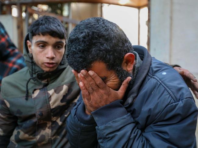 People mourn as they collect the bodies of friends and relatives killed in Rafah, Gaza. Picture: Getty Images