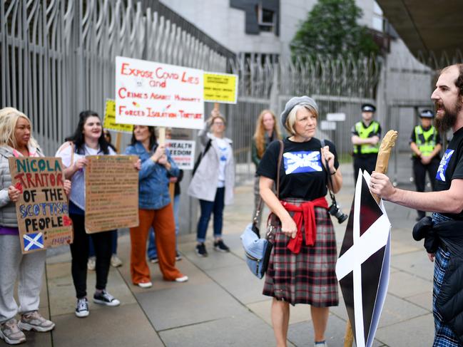 Protesters ranging from nationalists to COVID deniers gathered outside Scottish parliament. Picture: Jeff J Mitchell – Pool/Getty Images