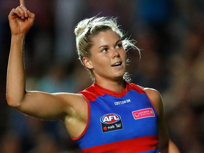 MELBOURNE, AUSTRALIA - MARCH 17: Katie Brennan of the Bulldogs celebrates a goal during the 2018 AFLW Round 07 match between the Western Bulldogs and the Melbourne Demons at VU Whitten Oval on March 17, 2018 in Melbourne, Australia. (Photo by Adam Trafford/AFL Media/Getty Images)