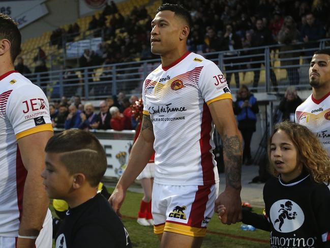 Israel Folau and teammates enter the pitch. Picture: AFP