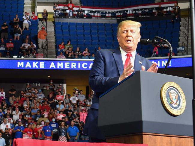 (FILES) In this file photo taken on June 20, 2020 The upper section is seen partially empty as US President Donald Trump speaks during a campaign rally at the BOK Center on June 20, 2020 in Tulsa, Oklahoma. - US President Donald Trump will host an outdoor campaign rally in New Hampshire, his team said on July 5, 2020, following a flopped rally in Tulsa, Oklahoma against the backdrop of COVID-19. (Photo by Nicholas Kamm / AFP)