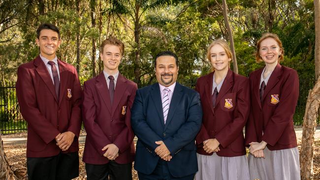 Sandgate District State High School captains Ryan Constable, Edmund Kanowski, Marisa Bedwell, and Kiara Harper-Giles with school principal Andy Stergou. Photo - contributed.