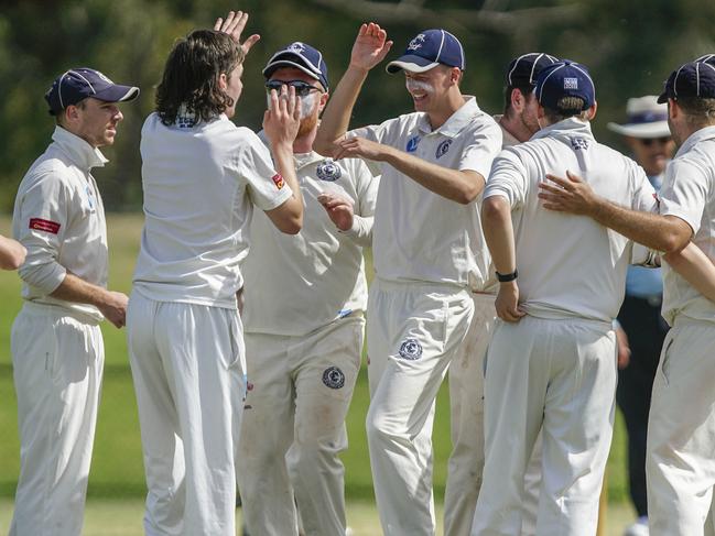 Sub-District cricket, Elsternwick v Moorabbin. Elsternwick bowler Jacob Kerr  is congratulated by his team mates. Picture: Valeriu Campan