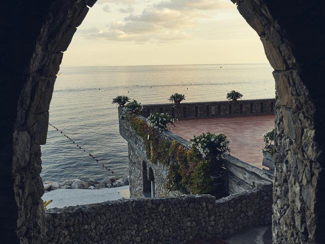 EMBARGO FOR WISH MAGAZINE 01 APRIL 2022. FEE MAY APPLY. Borgo Santandrea opened in 2021 on the Amalfi coast in Italy. It's perched 90 metres above thesea and has it's own private beach. Photo: Adrian Gaut