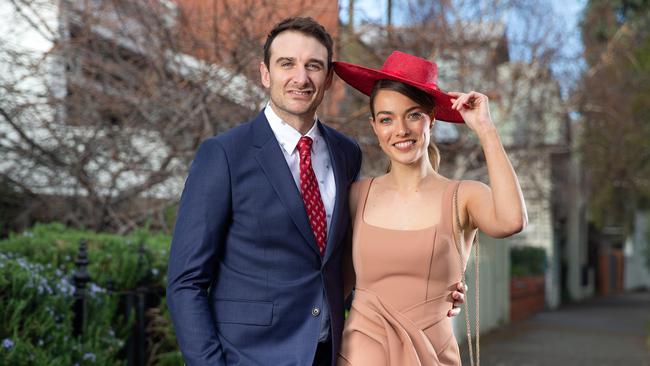 After meeting in New York, Jobe Watson and partner Virginia Slaghekke can’t wait to frock up for the Caufield Cup Carnival, which this year has a NYC theme. Picture: Sarah Matray