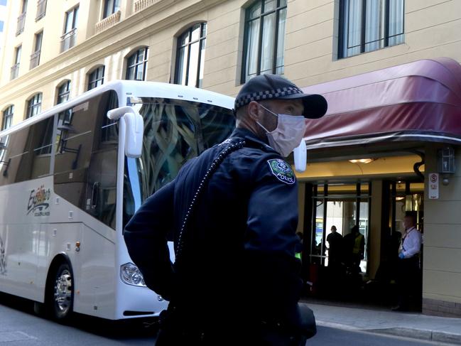 Passengers arrive at the Playford Hotel to start a 14 days of supervised quarantine after arriving in Adelaide on a mercy flight from Mumbai. The flight was second mercy flight repatriating Australians who were stranded abroad amid the coronavirus crisis. Photo By Kelly Barnes