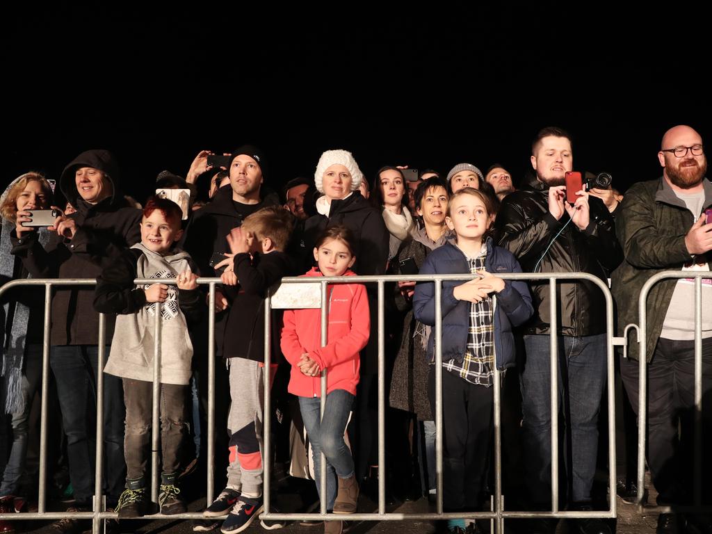 Part of the crowd with a front row view of the Ogoh-Ogoh burning at Dark Park. Picture: LUKE BOWDEN