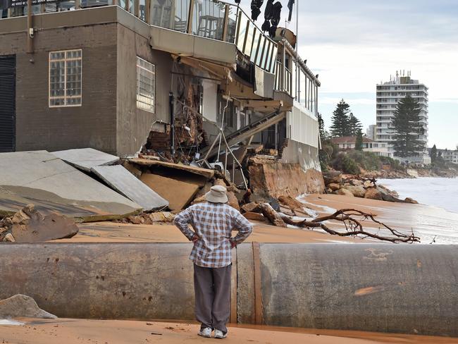 Inspecting the damage at Collaroy on Sydney’s northern beaches. Picture: William West/AFP