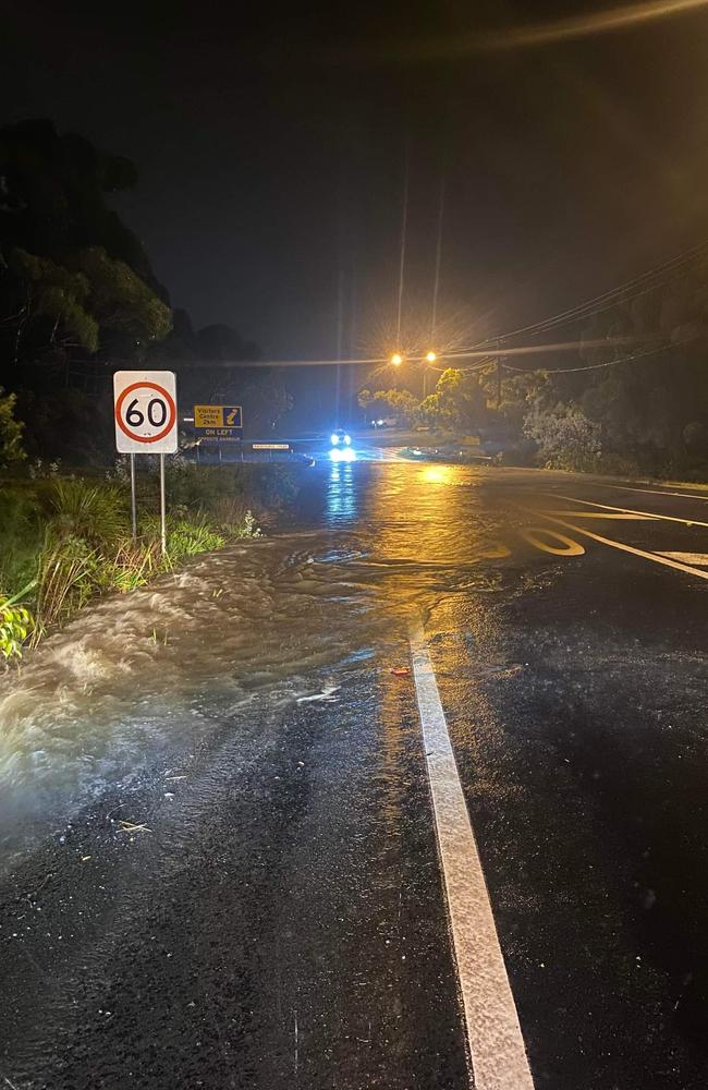 The Princes Highway was closed early in the morning on March 8 by rising flood waters. Picture: Ash Cooney