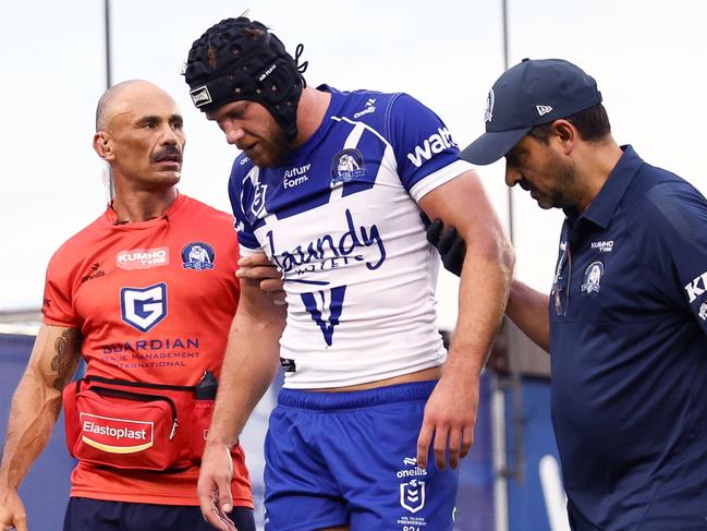 SYDNEY, AUSTRALIA - MARCH 16: Matt Burton of the Bulldogs walks off after sustaining an injury during the round two NRL match between Canterbury Bulldogs and Gold Coast Titans at Belmore Sports Ground, on March 16, 2025, in Sydney, Australia. (Photo by Jeremy Ng/Getty Images)