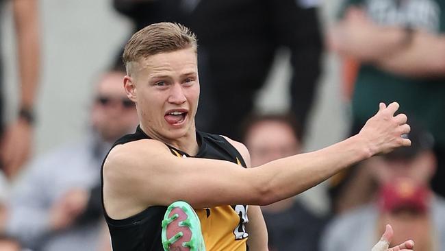 MELBOURNE, AUSTRALIA - SEPTEMBER 22: Flynn Young of the Tigers kicks the ball during the 2024 VFL Grand Final match between Werribee and the Southport Sharks at IKON Park on September 22, 2024 in Melbourne, Australia. (Photo by Rob Lawson/AFL Photos via Getty Images)