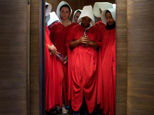 Women dressed as characters from The Handmaid's Tale protest President Donald Trump's newest Supreme Court nominee Brett Kavanaugh. Picture: AFP