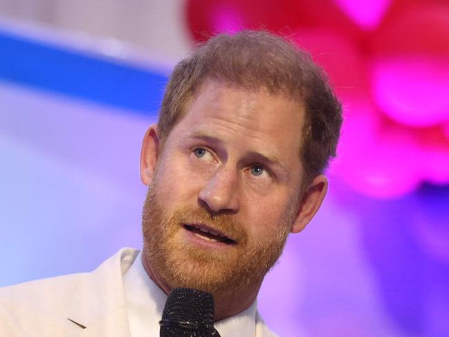 Britain's Prince Harry, Duke of Sussex, gives a speech as he attends a Sit Out with Britain's Meghan (unseen), Duchess of Sussex, at the Nigerian Defence Headquarters in Abuja on May 11, 2024 as they visit Nigeria as part of celebrations of Invictus Games anniversary. (Photo by Kola SULAIMON / AFP)