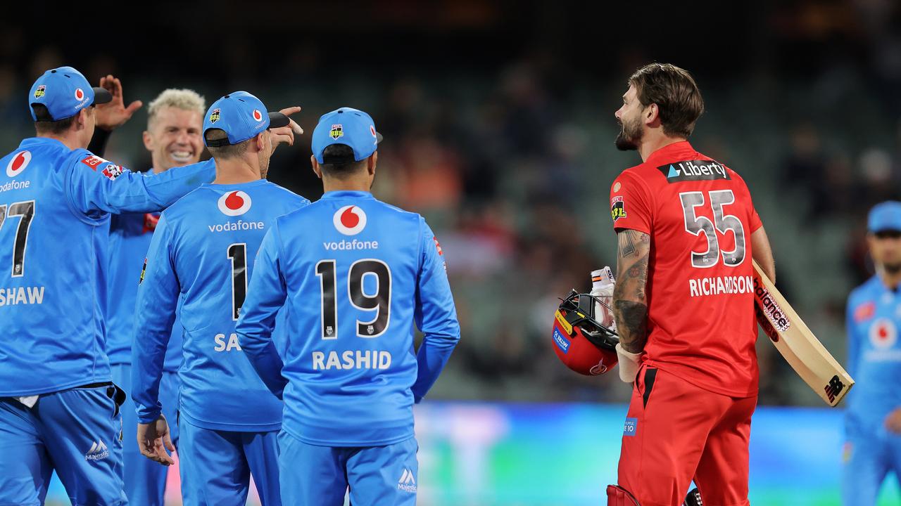 Kane Richardson clashes with the Strikers. (Photo by Daniel Kalisz/Getty Images)