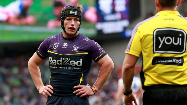 MELBOURNE, AUSTRALIA - JUNE 09:  Harry Grant of the Storm speaks with a referee during the round 14 NRL match between Melbourne Storm and Newcastle Knights at AAMI Park, on June 09, 2024, in Melbourne, Australia. (Photo by Kelly Defina/Getty Images)