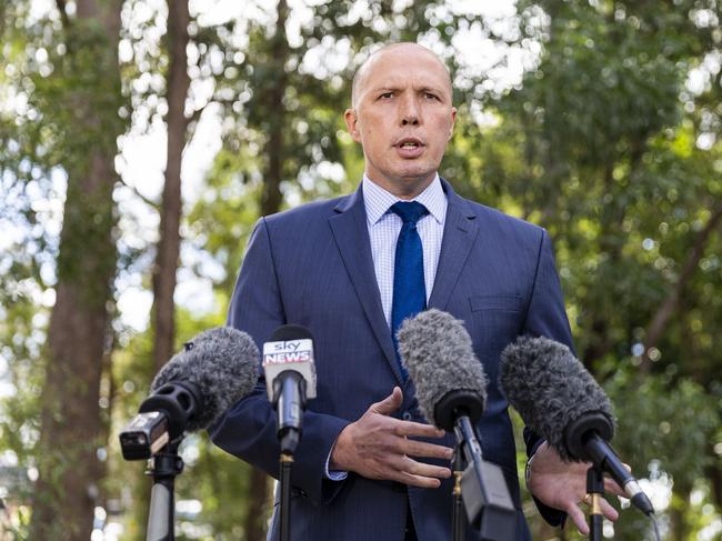 Minister for Home Affairs and Immigration and Border Protection Peter Dutton, speaks to media in Bracken Ridge, Brisbane, Friday, July 20, 2018.  Dutton has called on Opposition Leader Bill Shorten to explain whether embattled Labor MP Emma Husar used staff entitlements appropriately. (AAP Image/Glenn Hunt) NO ARCHIVING