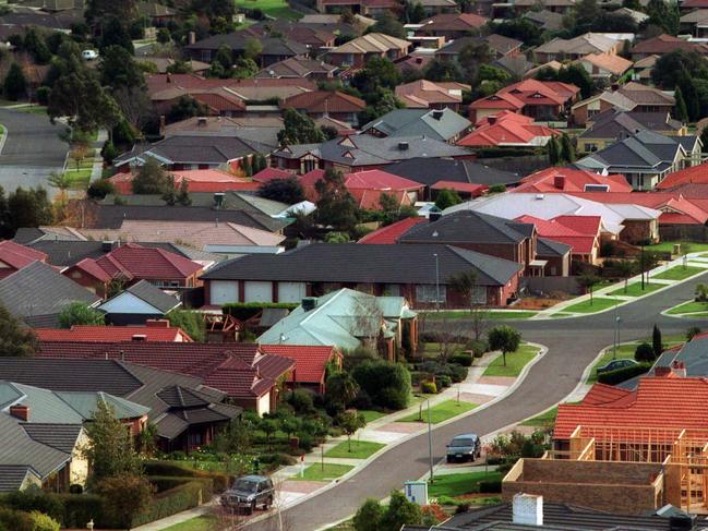 Elevated view of housing estates in Berwick, Melbourne, Victoria 12 Jun 2002. suburbia. homes. construction. aerial house houses building