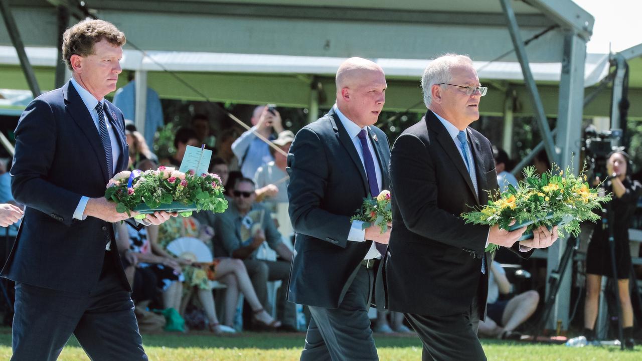 The Prime Minister Scott Morrison, Defence Minister Peter Dutton and Minister for Defence Personnel Andrew Gee during the 80th anniversary commemorations of the Bombing of Darwin at Darwins Esplanade. Picture: Glenn Campbell