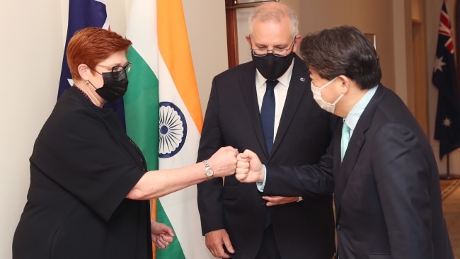 Australian Minister for Foreign Affairs Marise Payne and PM Scott Morrison greet Japanese Minister for Foreign Affairs Hayashi Yoshimasa on Friday. Picture: NCA NewsWire / David Crosling. POOL via NCA NewsWire