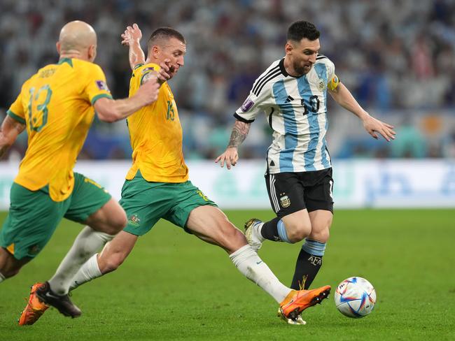 Duke attempts to get the ball off Messi. Picture: Martin Rickett/PA Images via Getty Images