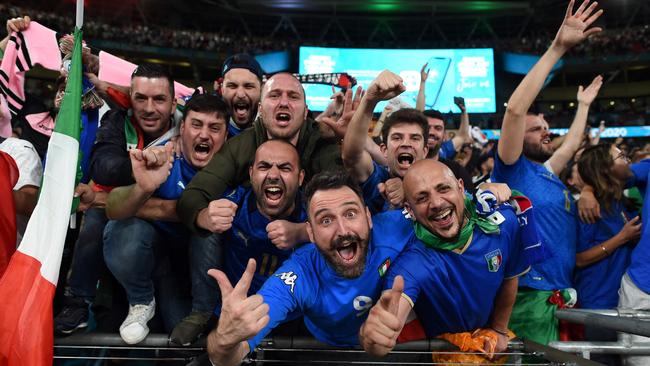 Italy fans celebrate their team's win in the UEFA EURO 2020 final football match between Italy and England at the Wembley Stadium in London.