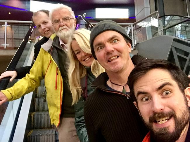 Jackie Taranto, centre, with (from top) late half-brother Dan Gunn, father Brian Gunn, brother Michael Gunn and half-brother Dillon Gunn.