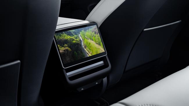 The Tesla Model 3 has a video display in the back seat.