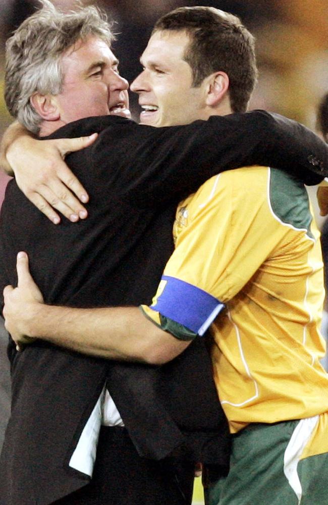 Guus Hiddink celebrates with captain Mark Viduka after Australia qualified for the 2006 World Cup. Pic: AP