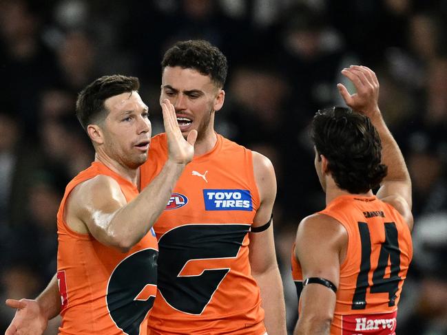 MELBOURNE, AUSTRALIA - AUGUST 27: Toby Greene of the Giants is congratulated by team mates after kicking a goal during the round 24 AFL match between Carlton Blues and Greater Western Sydney Giants at Marvel Stadium, on August 27, 2023, in Melbourne, Australia. (Photo by Quinn Rooney/Getty Images)