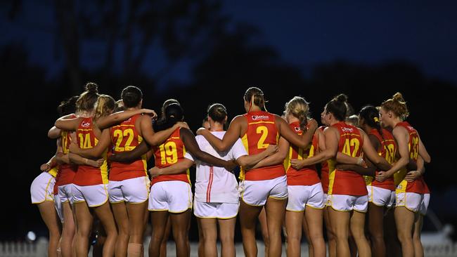 Gold Coast’s AFLW team has been forced into isolation. Picture: Albert Perez/AFL Photos via Getty Images