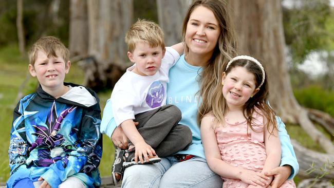 Renee Staska with her three young children, Hudson, 7, Austin, 4, and Holly, 6, who tragically have a type of juvenile dementia, a progressive and terminal illness. Picture: Naomi Jellicoe