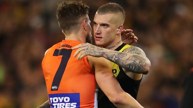 Brett Deledio hugs former teammate Dustin Martin after the preliminary final. Picture. Phil Hillyard