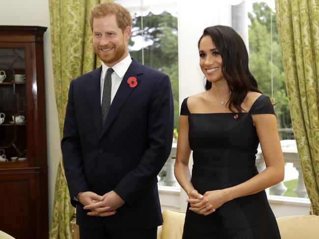 Prince Harry and Meghan Markle wait to meet New Zealand Prime Minister Jacinda Ardern at Government House. Picture: Getty