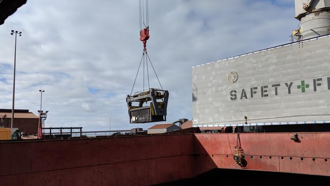 A secure container of copper concentrate from OZ Minerals’ Carrapateena, mine is lifted into a vessel at SIMEC Mining’s Whyalla Port.