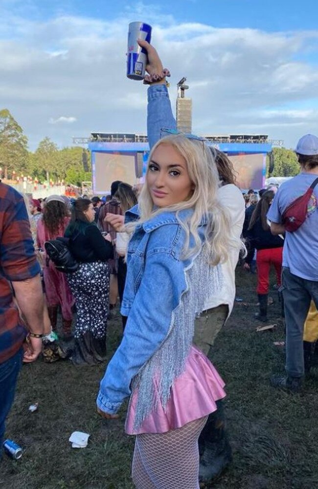 One woman braved the muddy conditions in a pink miniskirt and fringe jacket. Picture: Instagram/@georgejcgriffin