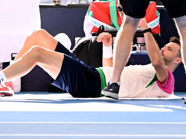 Grigor Dimitrov of Bulgaria receives treatment during the mens singles semi-final match against Jiri Lehecka of the Czech Republic at the Brisbane International. Picture: AFP