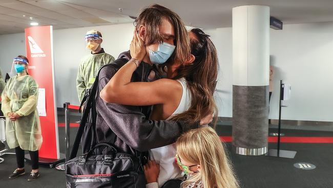 Tyler Szostak, 16, arrives from Sydney to see his mother Kim Von Ivan and sister Scarlett. Picture: Ian Currie