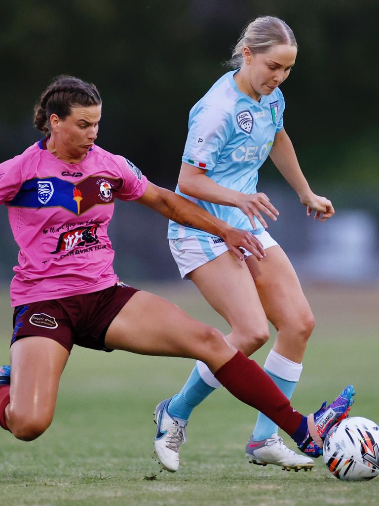 MA Olympic's Kizanne Mulder challenges Brisbane City FC player Halle Carn. Picture: Sharon Woodward.