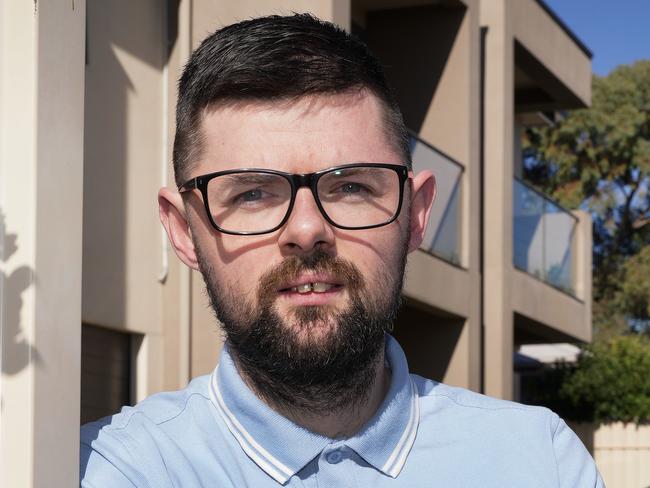 Jamie Bennie outside his home in Sturt. Along with wife Nicole, he is expecting their first child, but they recently  had their home broken into and their car stolen by youths. They are calling on the government to have new incentives for police recruits in the budget. 2 June 2024. Picture Dean Martin