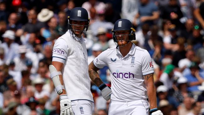 England's Stuart Broad (L) and England's captain Ben Stokes (R) chat during their stunning partnership. Picture: AFP