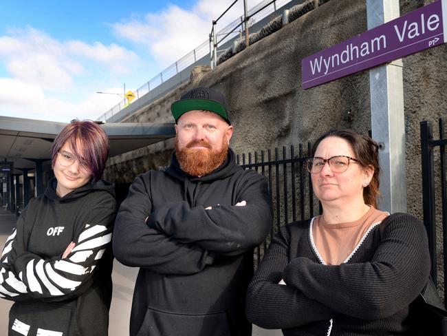 Jai Vesovic with his partner Seona Blake and her daughter Keira at Wyndham Vale station. Picture: Andrew Henshaw