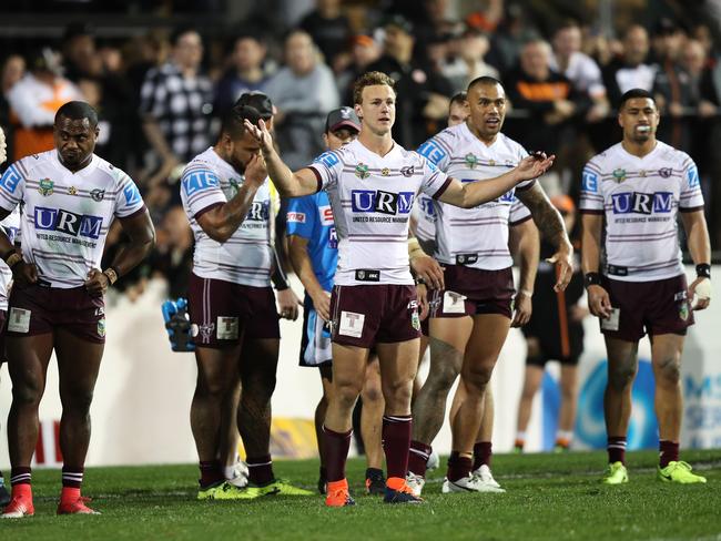 Dejected Manly players question the winning try by Tigers winger Malakai Watene-Zelezniak at Leichhardt Oval last weekend. Picture: Brett Costello