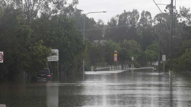 Flooding on the Gold coast in the aftermath of Cyclone Alfred. Chisolm Rd cut.. Picture Glenn Hampson