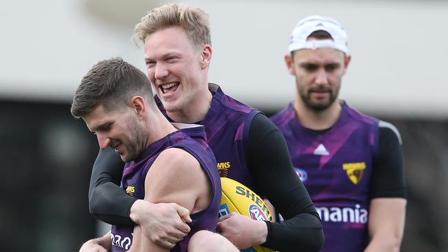 James Sicily with teammate Luke Breust at Hawthorn training. Picture: Michael Klein