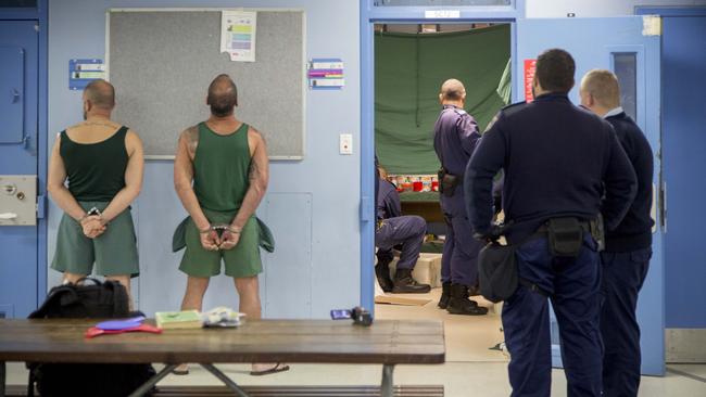 Raids taking place at the Parklea Correctional Centre where a knife, mobile phones and drugs hidden in toilets, food packages and televisions were discovered in the prison. (AAP Images/ CORRECTIVE SERVICES NSW)