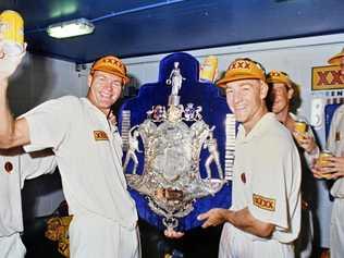 BREAKING THE DROUGHT: Ipswich regional cricketers Dick Tazelaar and Andy Bichel share in Queensland's first Sheffield Shield victory after nearly seven decades of torment. Picture: QT file